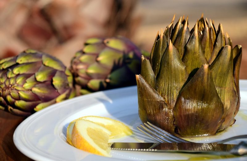 cooked artichoke showing how leaves become transluscent