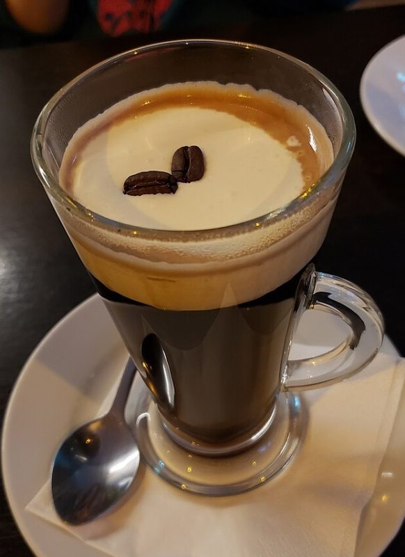coffee liqueur served with roasted coffee beans on top 