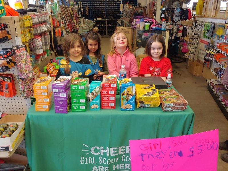 girl scouts at cp dudleys store selling their cookies
