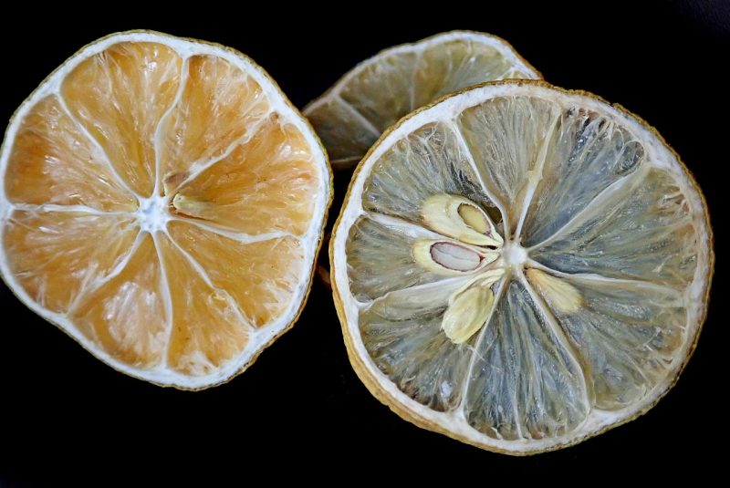 dried citrus fruits on a black background
