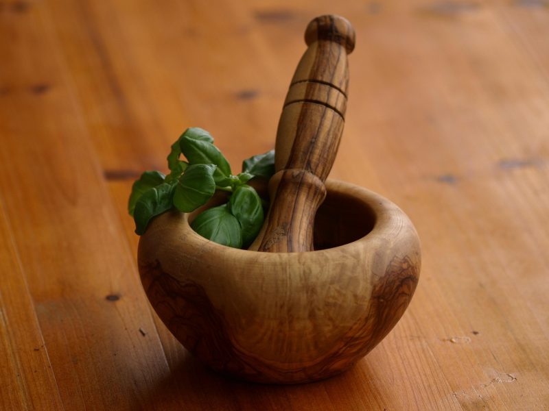 mortar and pestle to crush basil