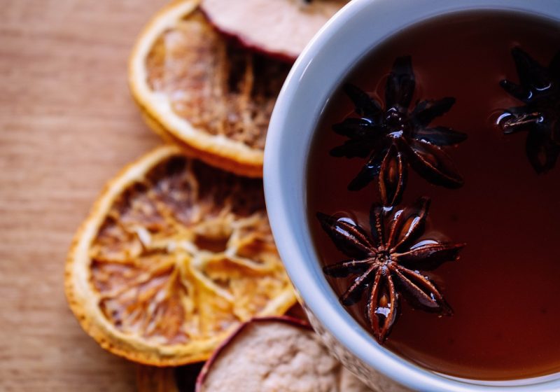 warm herbal tea with orange fruit slices