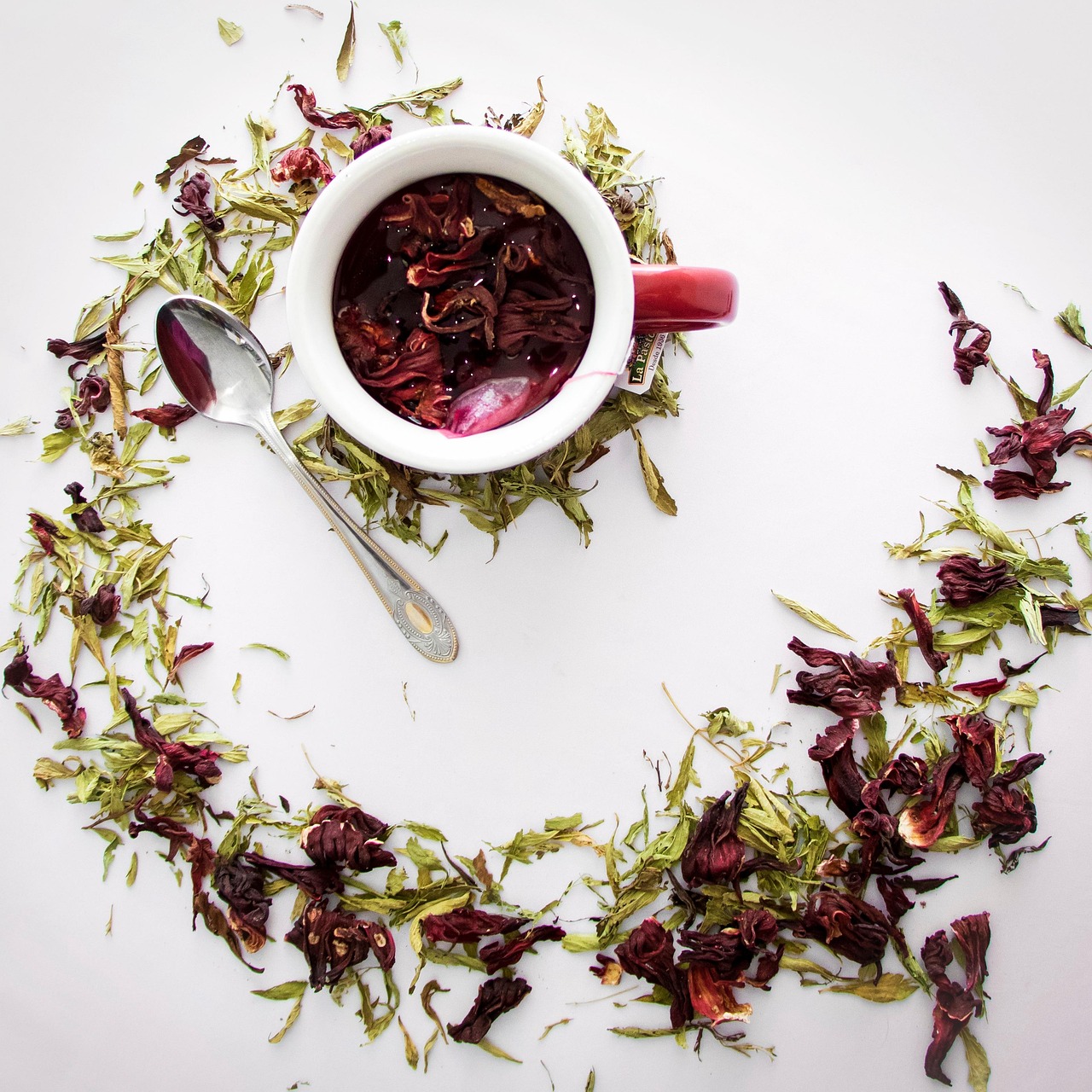 mug of red hibiscus flower tea
