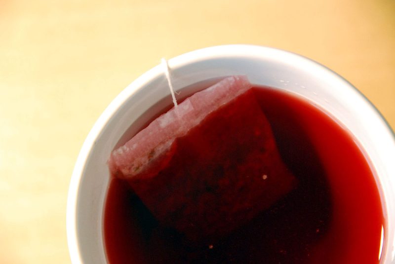 cup of red hibiscus flower tea copyright C.Bill