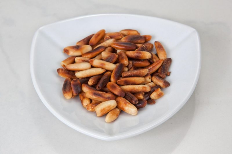 pine nuts over toasted