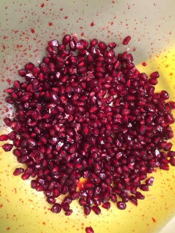 pomegranate juice being made for a recipe