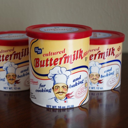 three containers of powdered buttermilk from the store