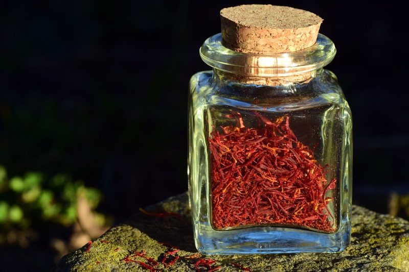 red saffron threads in a jar