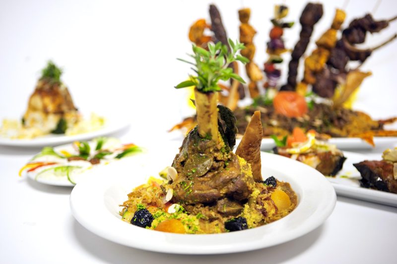 tagine a moroccan stewed dish named for the pot it is cooked in