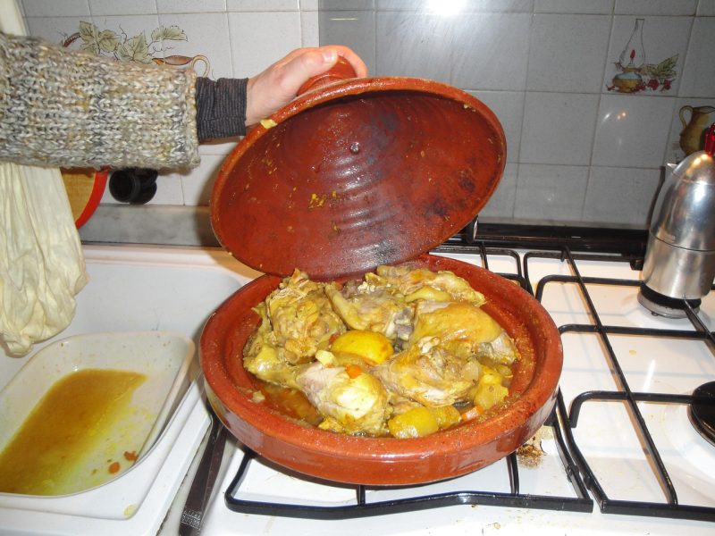 tagine a moroccan stewed dish named for the pot it is cooked in
